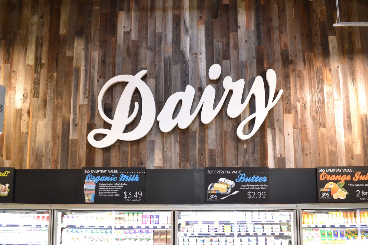 Good Neighbor Brushed Paneling multicolor sustainable wood planking accent wall from WD Walls in a Whole Foods