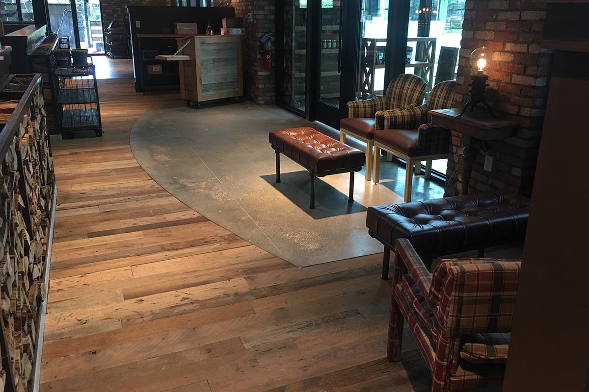Sustainable Reclaimed Barn Wood Flooring and Wall Paneling in Restaurant